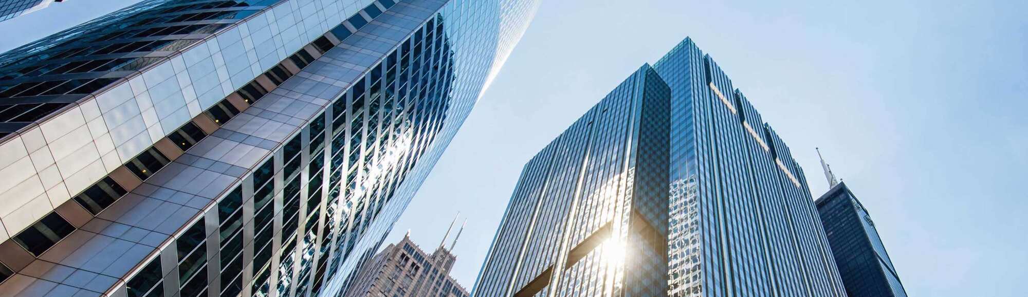View of city skyscrapers looking from the ground up to the sky