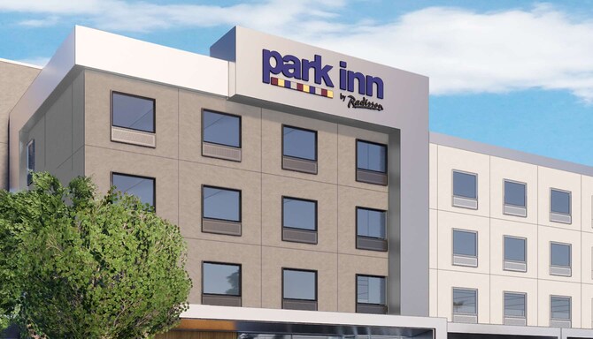 The Park Inn by Radisson sign on the exterior of a hotel