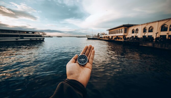 Radisson Rewards Brand - Man holding a compass