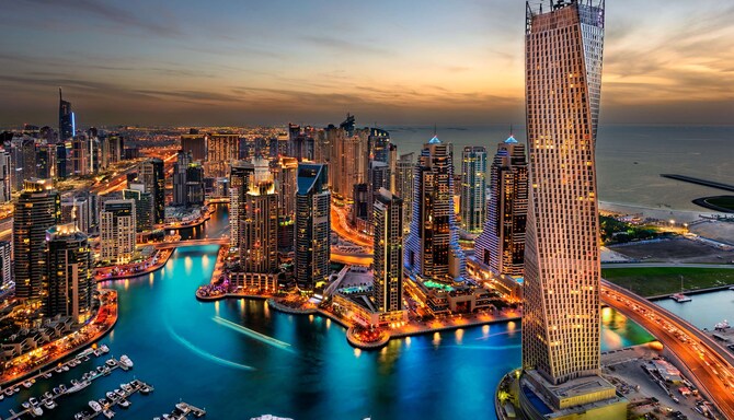 Dubai City view at sunset with skyscrapers