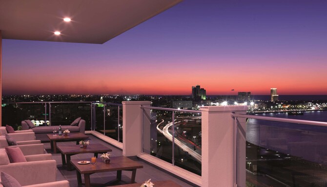 Al Mahary Radisson Blu Hotel, Tripoli - Terrace at the evening/night