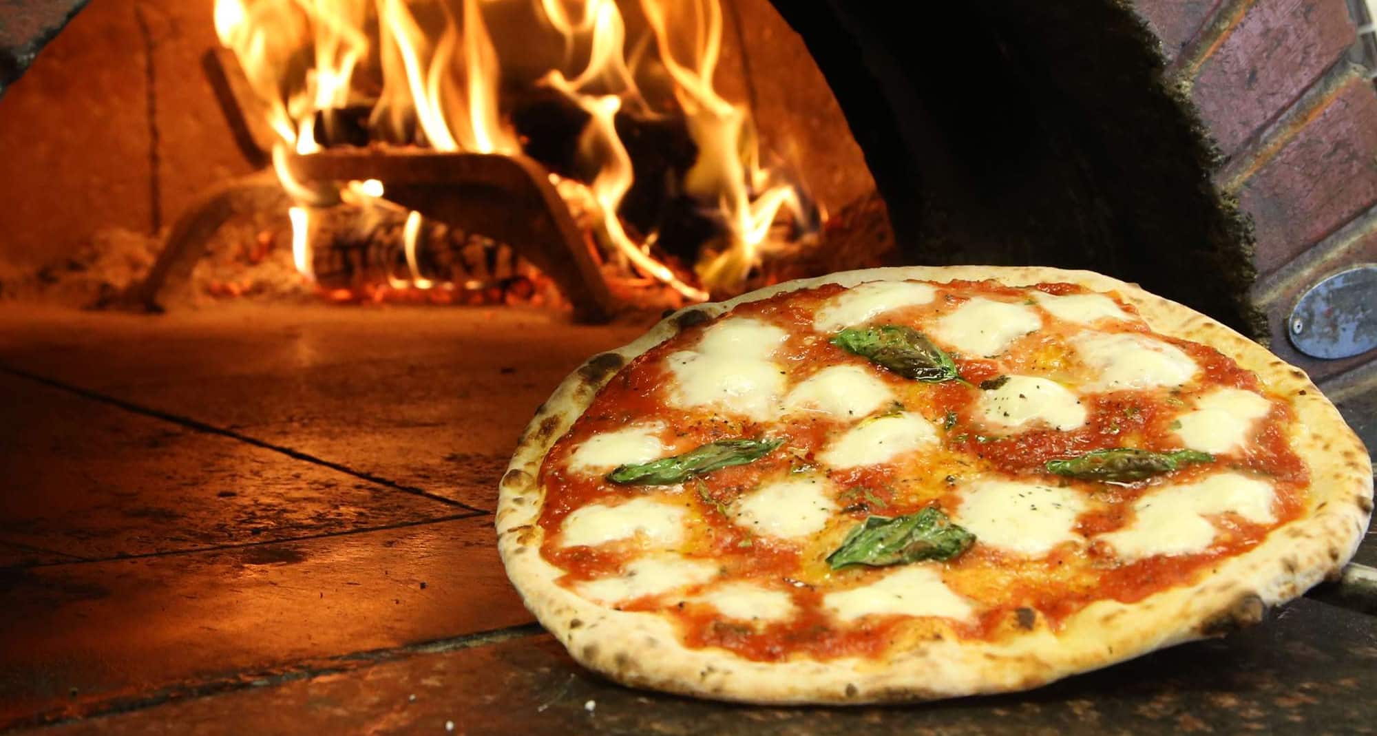 Blog images - A Culinary Journey: Unveiling the Best Italian Dishes - hero image pizza oven