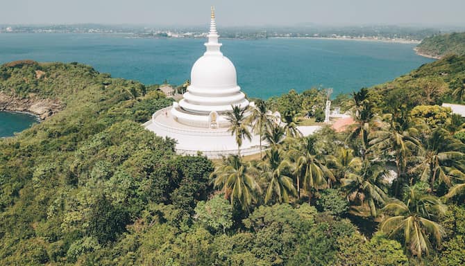 Blog images - 2023 - Uncover the Natural and Cultural Jewels of Sri Lanka Thiriyai temple overlooking Jungle beach in Unawatuna Galle