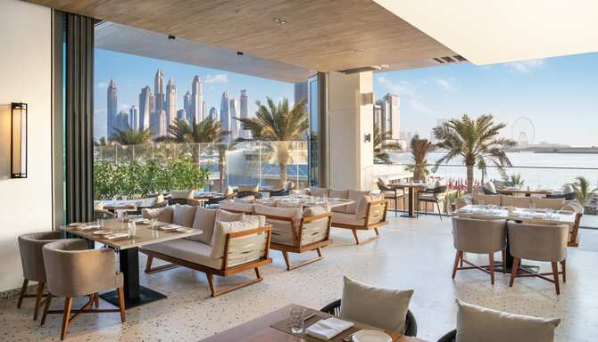 Radisson Resort Palm Jumeirah Dining View - 3 GREAT REASONS TO BOOK A STYLISH BEACH ESCAPE AT DUBAI'S NEWEST RESORT