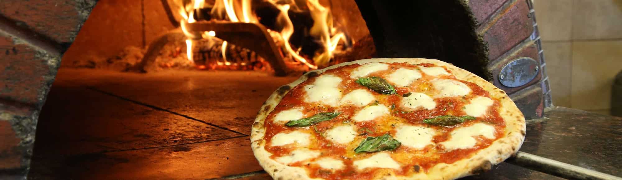 Blog images - A Culinary Journey: Unveiling the Best Italian Dishes - hero image pizza oven