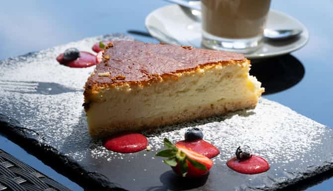 Blog images - The best Polish Traditional Food to fall in love with - Sernik served nicely with fruits