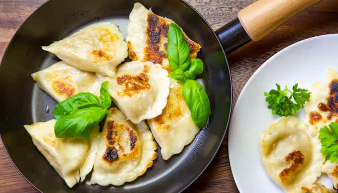 Blog images - The best Polish Traditional Food to fall in love with - Pierogi on a pan