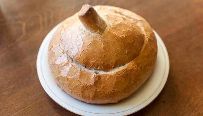 Blog images - The best Polish Traditional Food to fall in love with - Żurek soup served in closed bread