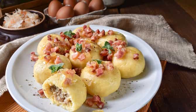 Blog images - The best Polish Traditional Food to fall in love with - Kluski śląskie on a plate