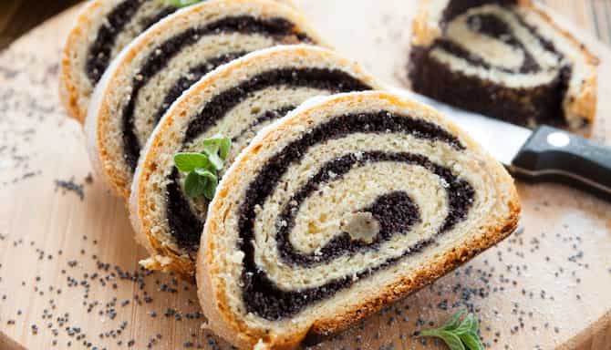 Blog images - The best Polish Traditional Food to fall in love with - Makowiec on a wooden plate