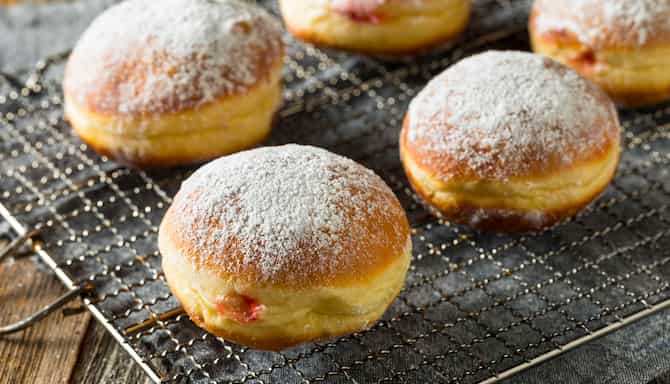 Blog images - The best Polish Traditional Food to fall in love with - Pączki with a sugar powder