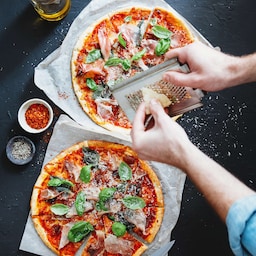 Blog images - The best Polish Traditional Food to fall in love with - two pizzas on the table