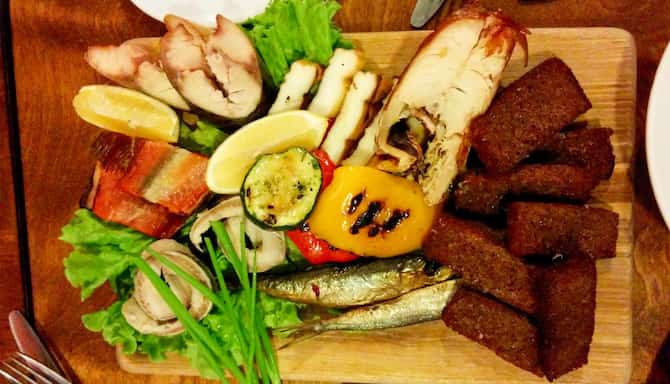 Blog images - 2025 - Latvian food Riga a taste of tradition Food amp Drink Smoked fish platter with brown bread Riga Lat