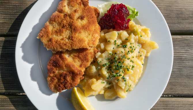 Blog images - 2025 - Frankfurt Food A Culinary Journey Through German Delights Food amp Drink Wiener schnitzel with pota
