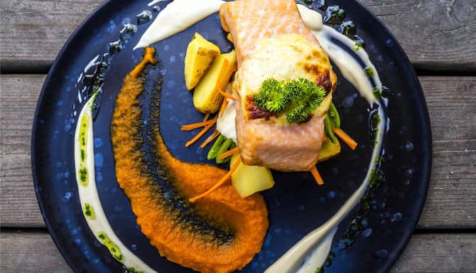 Blog images - 2025 - Traditional Norwegian Food A Culinary Journey Through Oslo Food n Drink Dish of salmon with potatoe