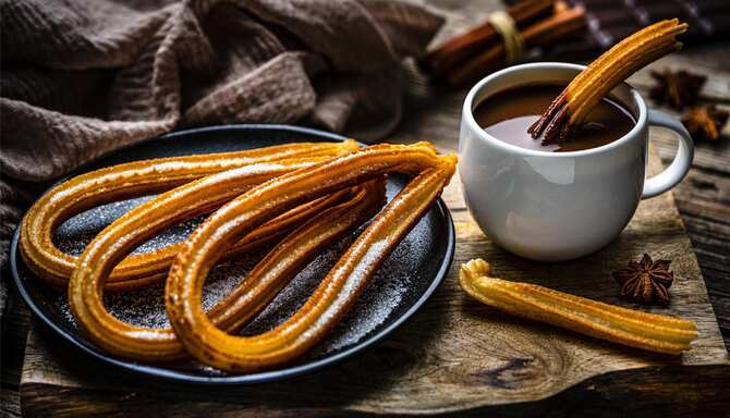 Blog images - 2025 - Churros plate and hot chocolate mug