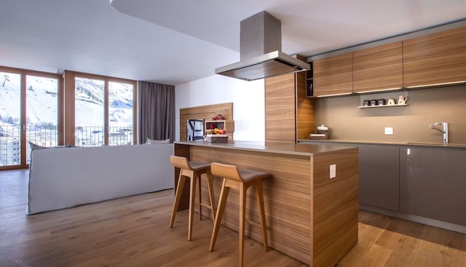 Corporate - Business Development - Radisson Blu Hotel Reussen Andermatt Bedroom Residence Kitchen