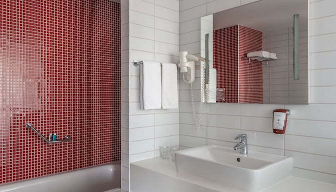 Cosmos Astrakhan Hotel, a member of Radisson Individuals - ванная комната в люксе Junior