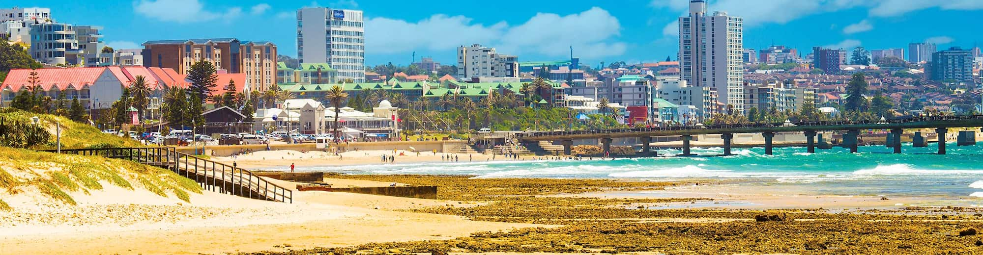 Reiseziel-Seiten - Strand- und Stadtblick in Port Elizabeth