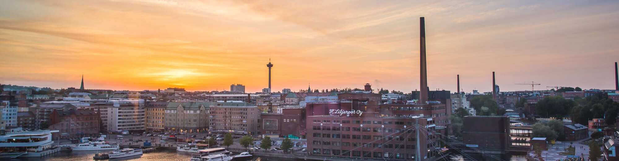 Destination Pages - Nordics and Benelux, UK and Ireland - Visit Tampere sunset over Laukontori from Periscope restaurant Ratina Laura Vanzo