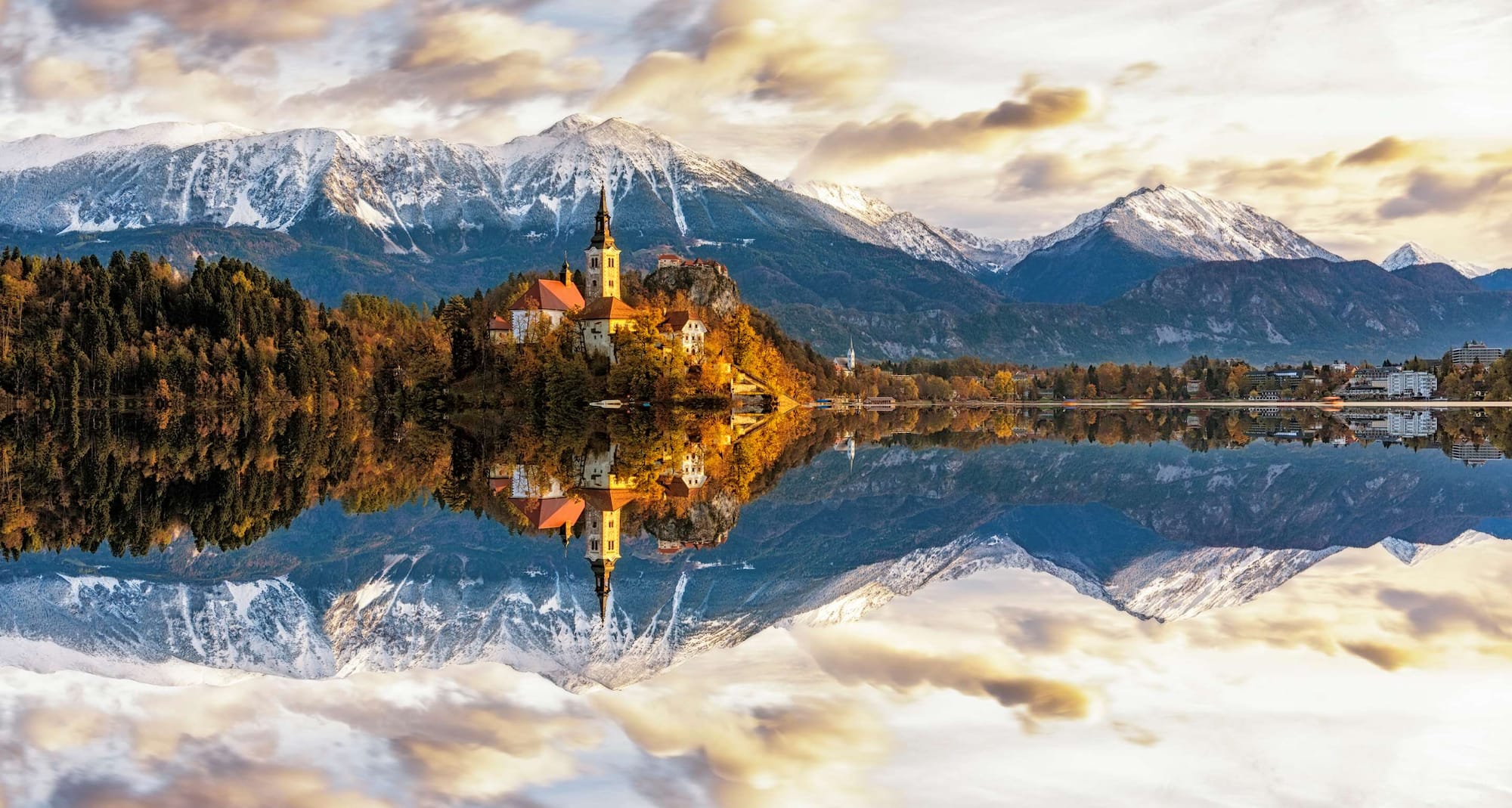 Destination Pages - Church with Mountains in the Background Slovenia