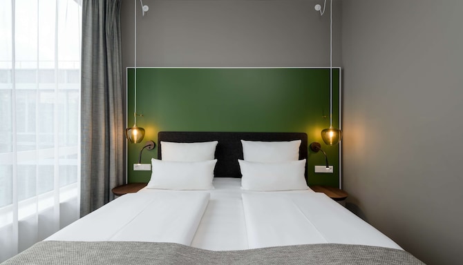 Flightgate Munich Airport Hotel, a member of Radisson Individuals - Gaestezimmer