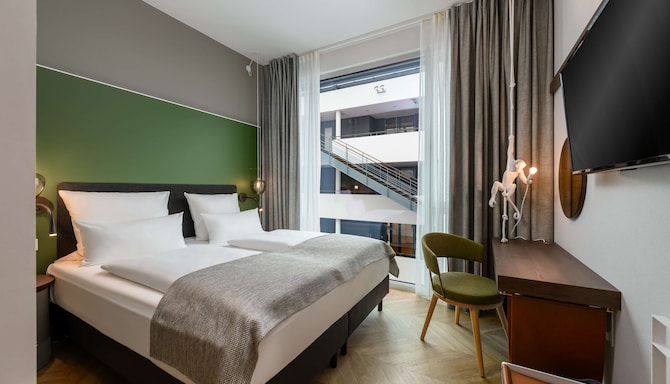 Flightgate Munich Airport Hotel, a member of Radisson Individuals - Gaestezimmer