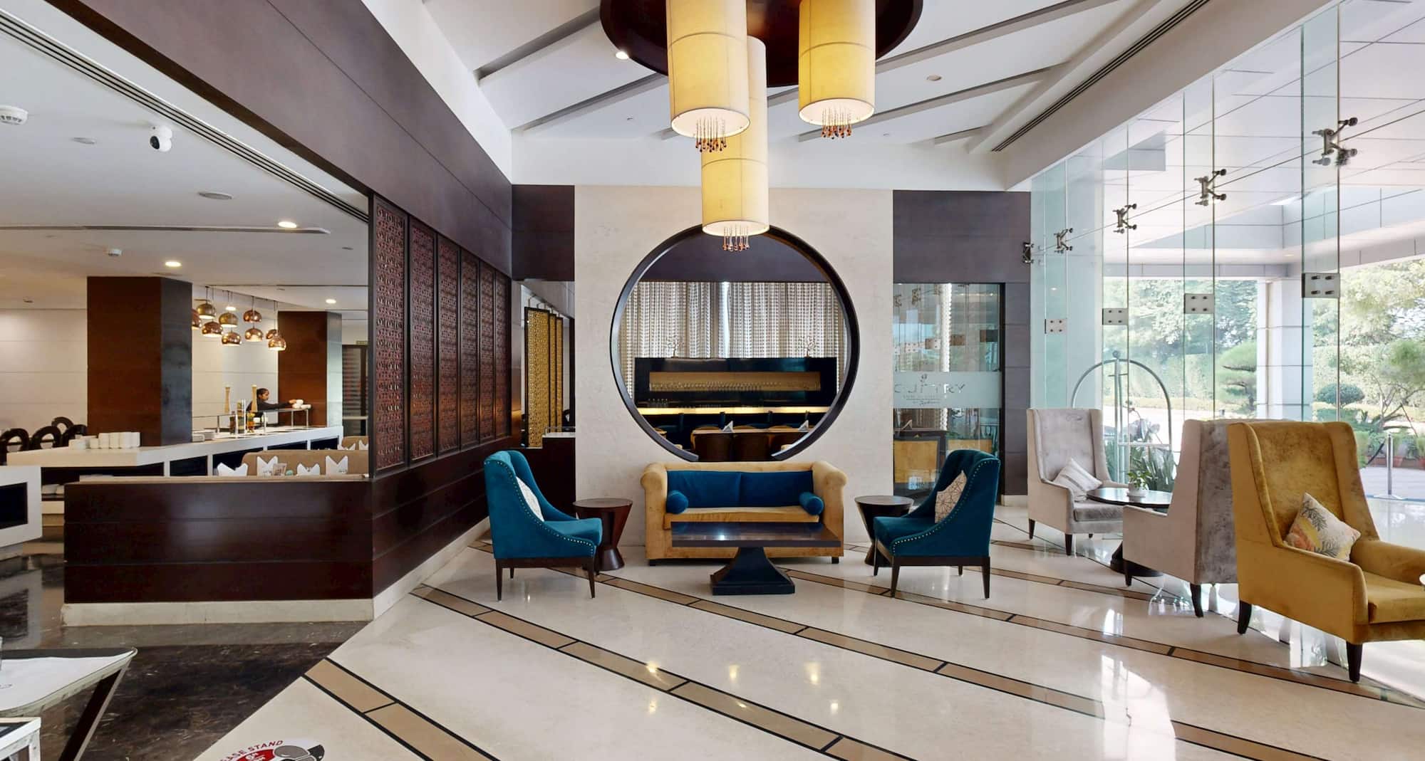 Gurmon Hotels Sohna Road Gurugram, a member of Radisson Individuals - Lobby Seating