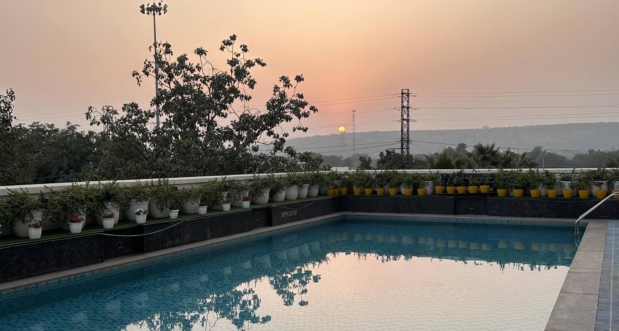 Gurmon Hotels Sohna Road Gurugram, a member of Radisson Individuals - Poolside