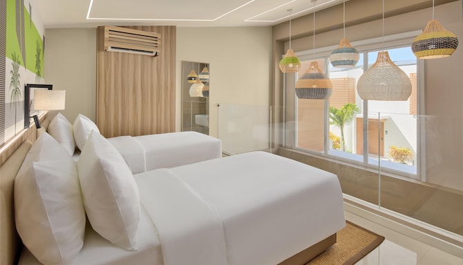 LIME Resort Bohol, a member of Radisson Individuals Premier - One Bedroom Duplex Villa Twin Room Garden View