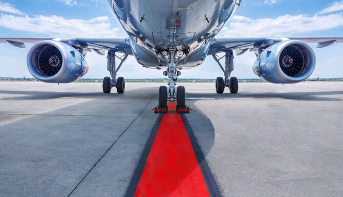 Radisson RED - Red runway and airplane
