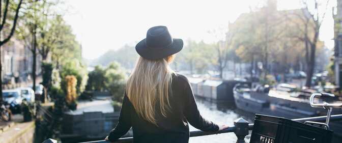Offers and Packages - Experience Package - City Break - Girl by the canal