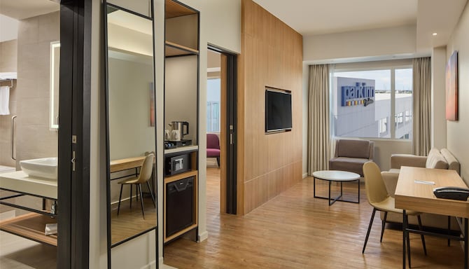 Park Inn by Radisson Clark - One Bedroom Deluxe Suite Living Room