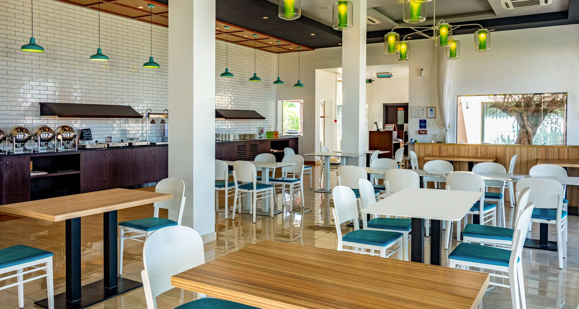 فندق وريزيدنس بارك إن باي راديسون الدقم - المطعم