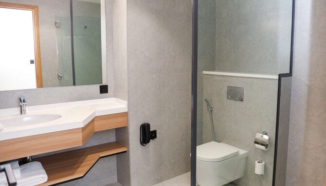 Park Inn by Radisson Muscat - حمام غرفة الضيوف