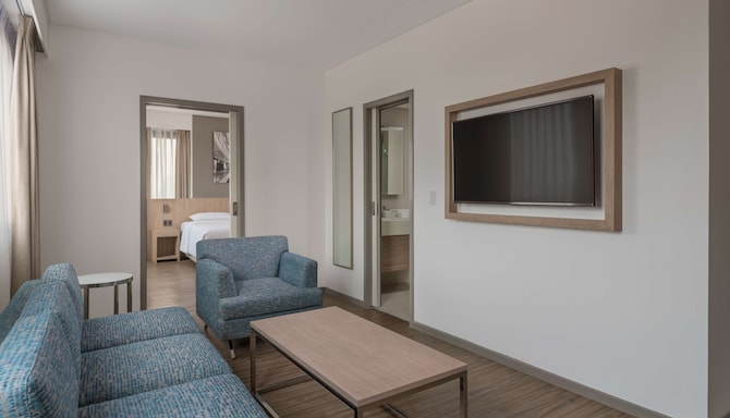 Park Inn by Radisson North EDSA - One Bedroom Suite Living Room