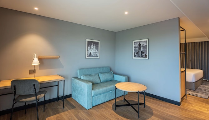 Park Inn & Suites by Radisson Thrissur East Fort - Superior Room with Balcony living Room
