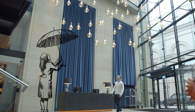 Paperboyo lobby illustration at The Edwardian Manchester