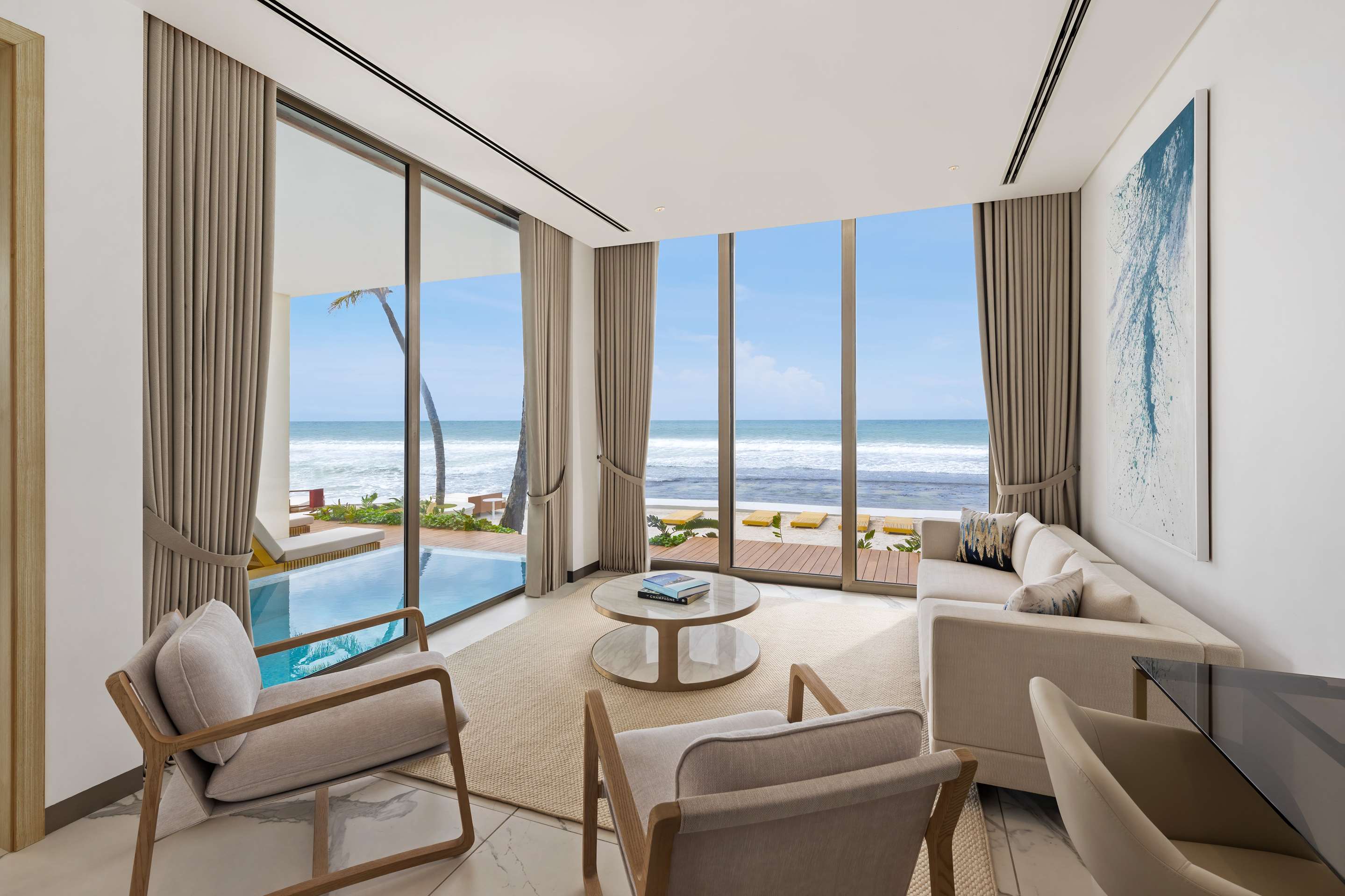 PR - EMEA 2024 - One Bedroom Pool Suite Beachfront View Lounge