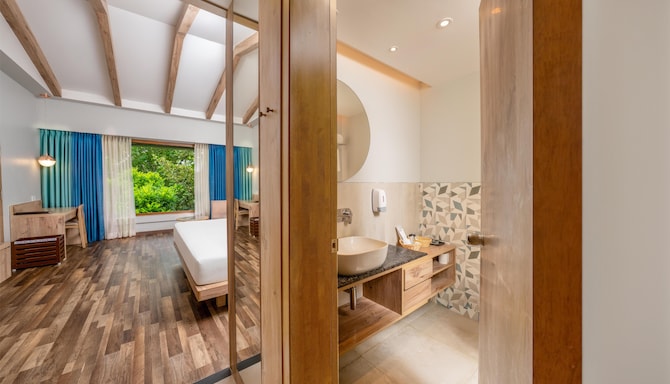Purple Palms Resort & Spa Coorg, a member of Radisson Individuals Premier - Standard Room- Garden view