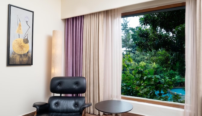 Purple Palms Resort & Spa Coorg, a member of Radisson Individuals Premier - Standard Room - Pool view