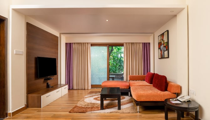 Purple Palms Resort & Spa Coorg, a member of Radisson Individuals Premier - Suite Living Room