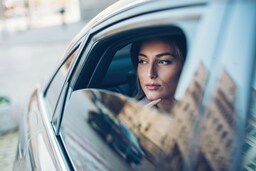 Radisson Blu Brand - Model in a car