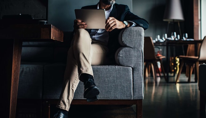 Radisson Blu Brand - Man on sofa