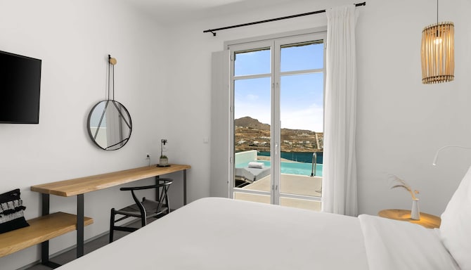 Radisson Blu Euphoria Resort, Mykonos - Junior Suite with Private Pool - Sea View_Bedroom