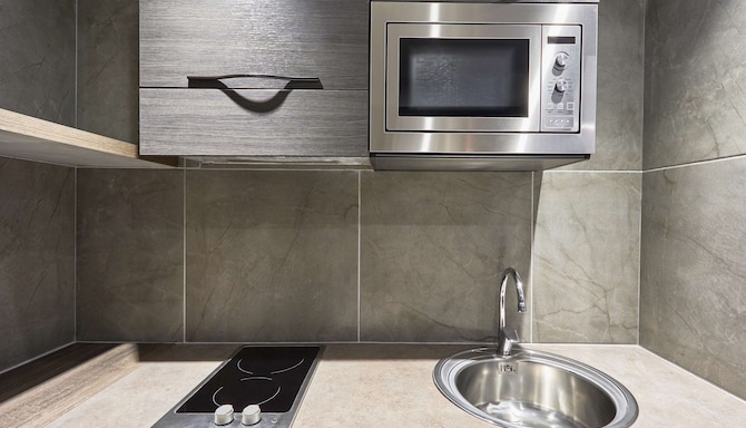 Radisson Blu Hotel, Antananarivo Waterfront - Люкс кухня / мини-кухня