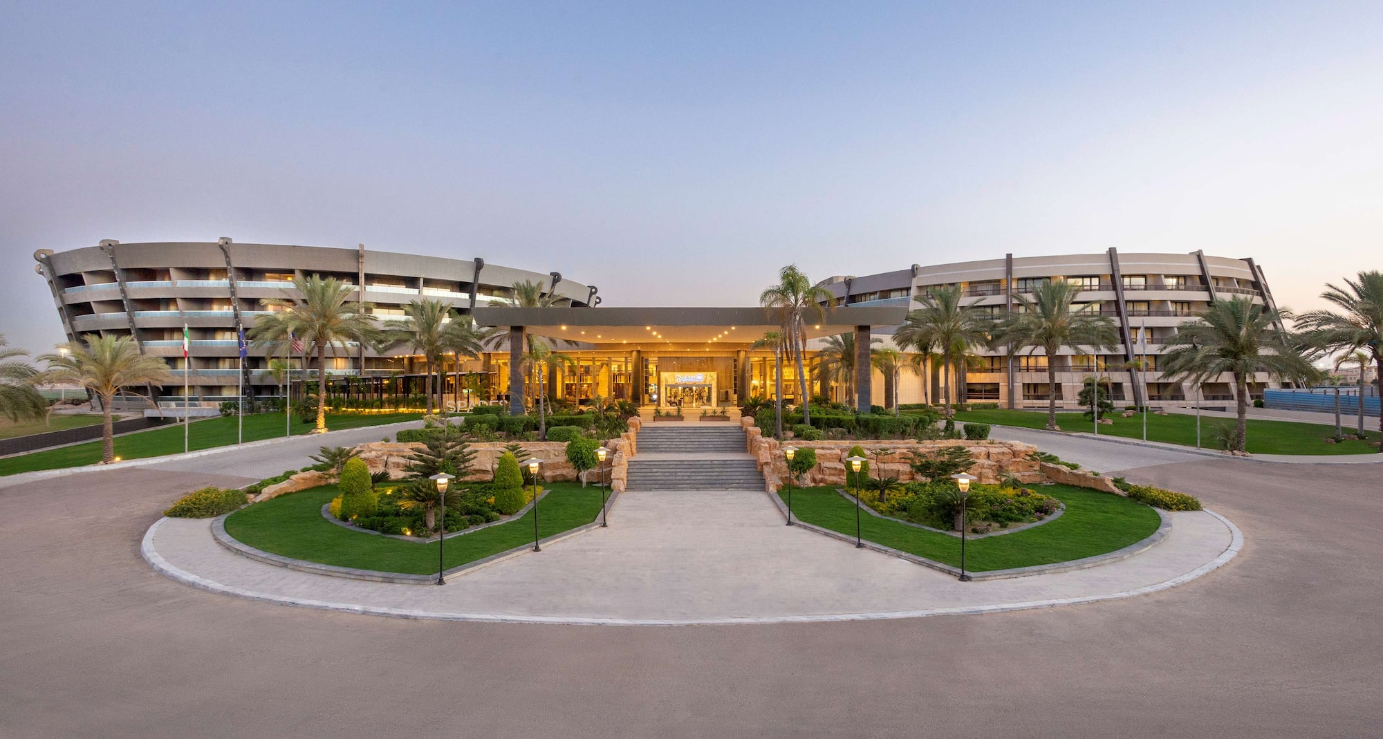 Radisson Blu Hotel & Convention Center, Alexandria - Exterior Night