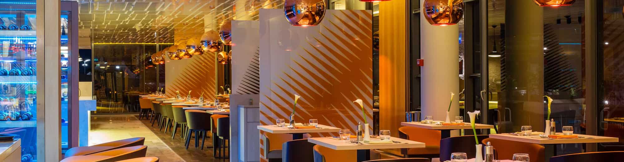 Radisson Blu Hotel & Convention Centre Kigali - Restaurant Filini, tables