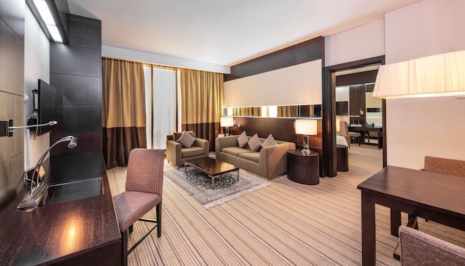 Radisson Blu Hotel, Doha - One Bedroom Apartment living area