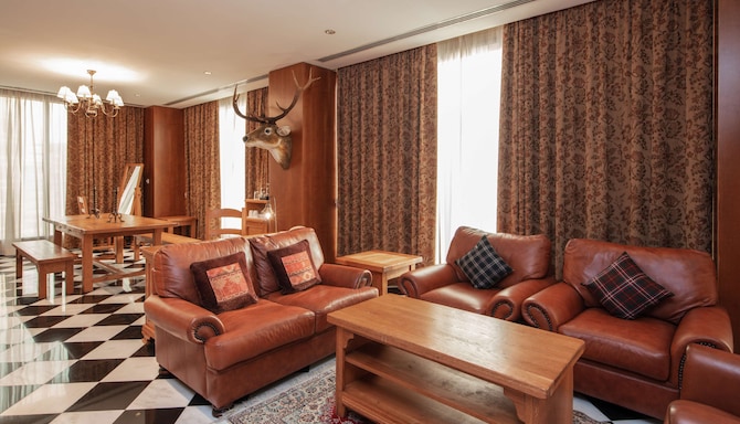 Radisson Blu Hotel, Doha - Scottish Baronial living and dining area